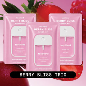 Close-up of Touchland Berry Bliss bottle label and nozzle highlighting hydrating formula