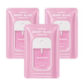 Touchland front view of Berry Bliss trio showing three travel bottles and scent benefit