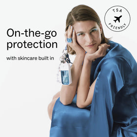 Touchland label detail with ingredients visible, emphasizing hydrating formulation