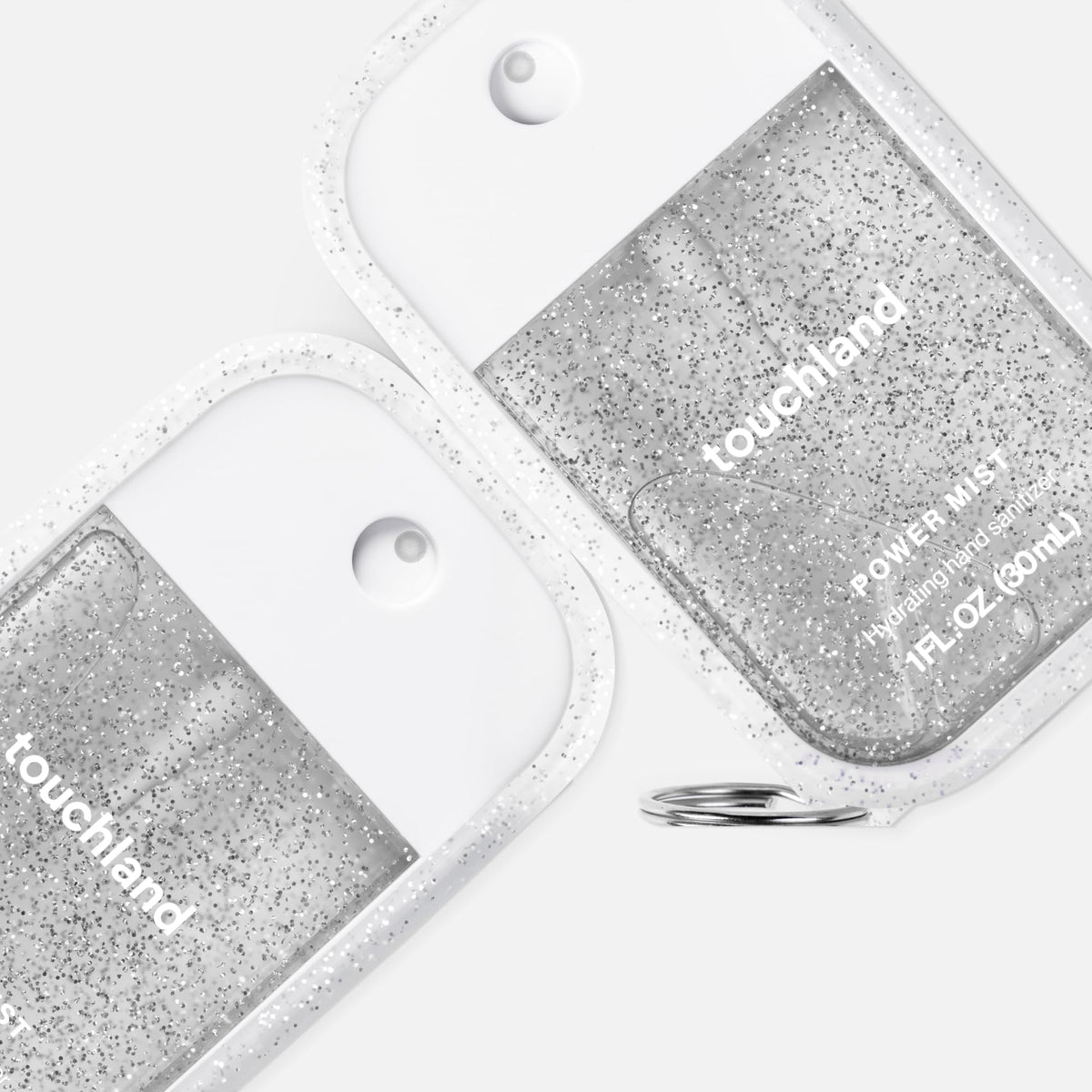 Touchland case attached to keys demonstrating quick access and hands-free carrying benefit