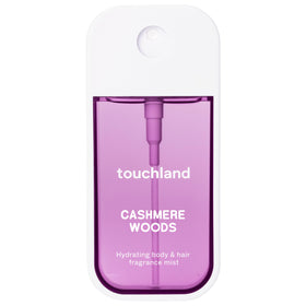 Touchland Cashmere Woods front bottle showing compact design and scent