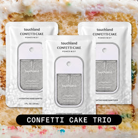 Touchland Confetti Cake three bottles styled to show travel convenience