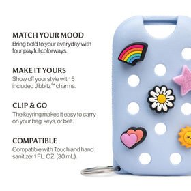 Hand holding Touchland case showing compact one-ounce scale