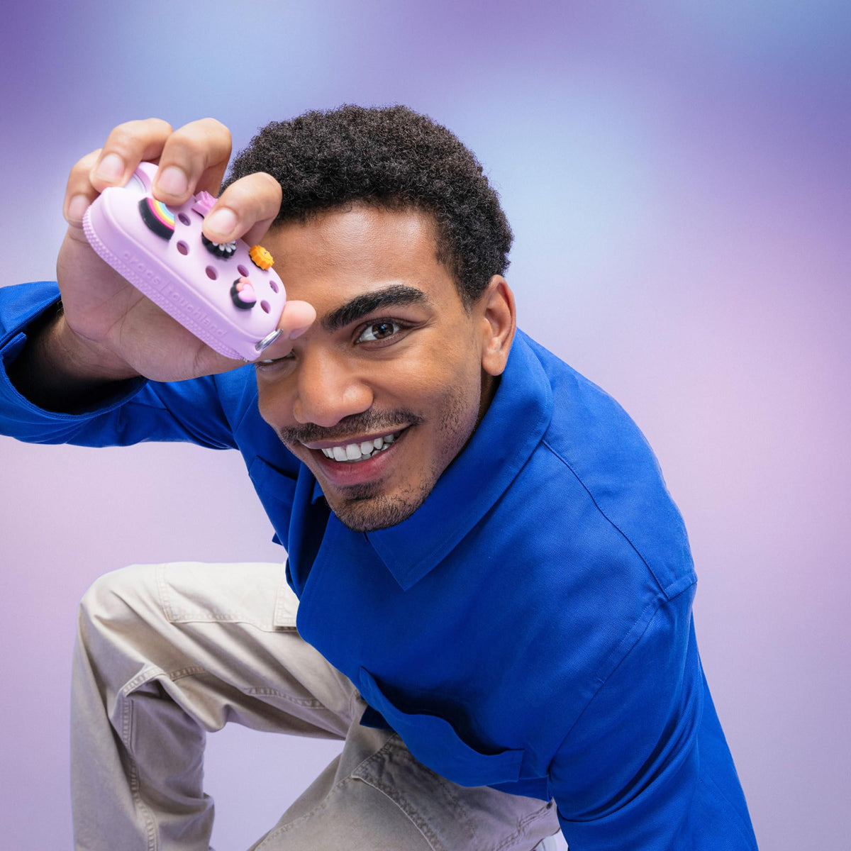 Touchland case with five included Jibbitz charms displayed for customization benefit