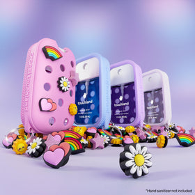 Touchland case clipped to a bag with mist in use offering convenient access