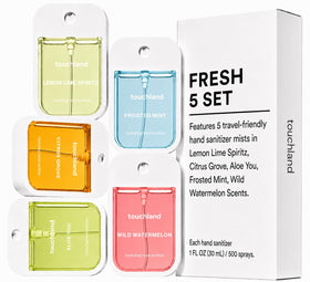 Touchland mist on hand illustrating moisturizing formula with aloe for softer skin