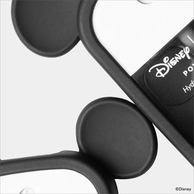 Touchland case held in hand showing compact size and portability