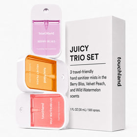 Touchland Velvet Peach mist on hand demonstrating hydrating texture and comfortable feel