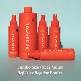 Tower 28 size comparison in hand showing jumbo 16 oz practical volume