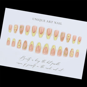 Toypoels nails on hand showing medium almond shape and natural fit