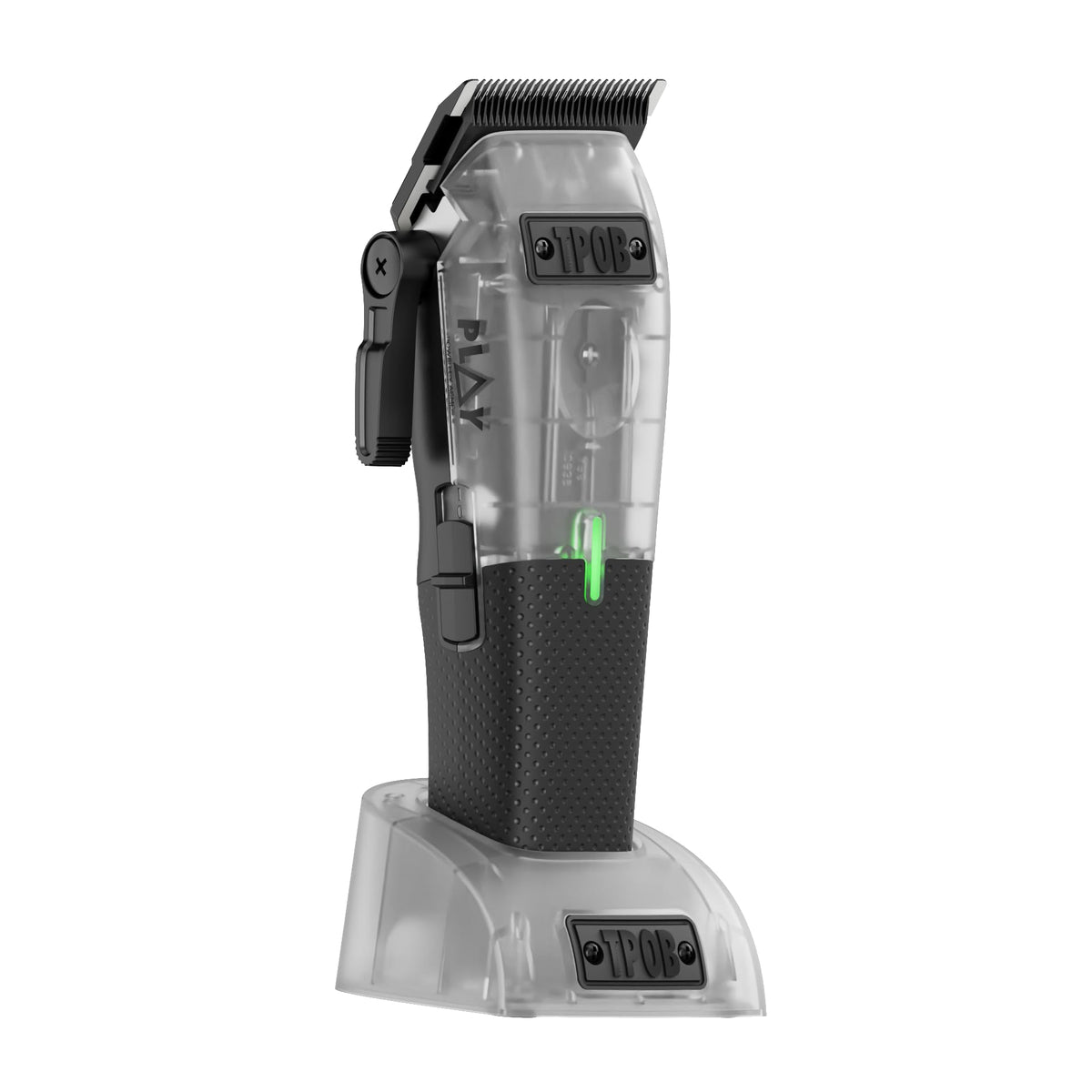 TPOB clipper in use in a barber chair showing quiet, precise cutting benefit