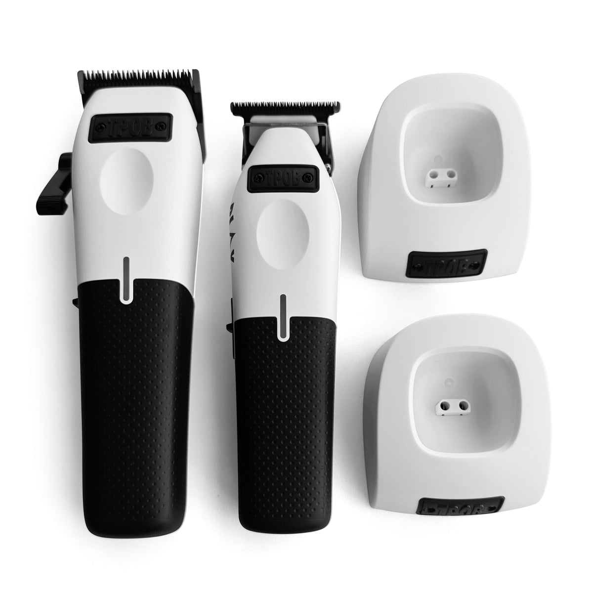 TPOB clippers in use trimming a client demonstrating precise fades and quiet operation