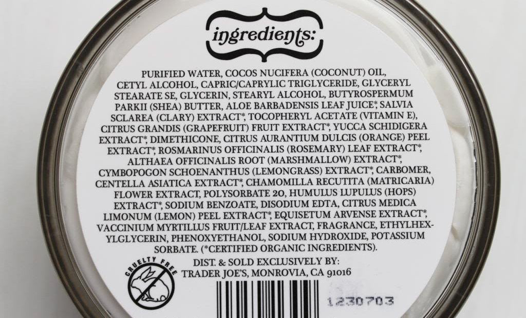 Trader Joe's tubs on a bathroom shelf suggesting daily moisturizing routine