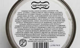 Trader Joe's tubs on a bathroom shelf suggesting daily moisturizing routine
