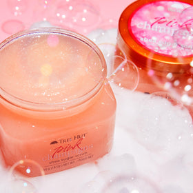 Tree Hut jar open revealing creamy sugar scrub texture that hydrates