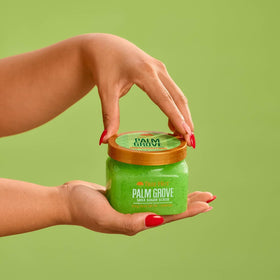 Tree Hut label detail highlighting Palm Grove fragrance notes and vegan claim