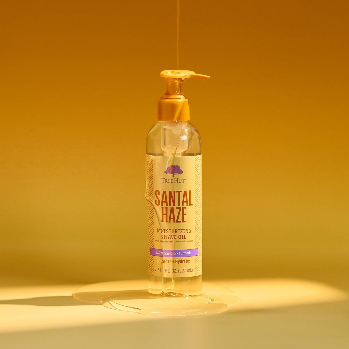 Tree Hut oil applied to lower leg during shaving highlighting smooth razor glide