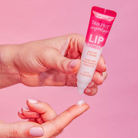 Tree Hut Sugarlips with shea butter and rosehip visuals highlighting nourishing ingredients