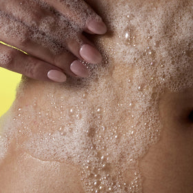 Tree Hut gel texture on hand illustrating creamy lather and hydration