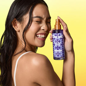 Tree Hut mist spraying to show fine spray for hair and body freshness
