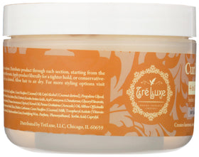 Treluxe applied to damp curly hair demonstrating enhanced curl definition and moisture