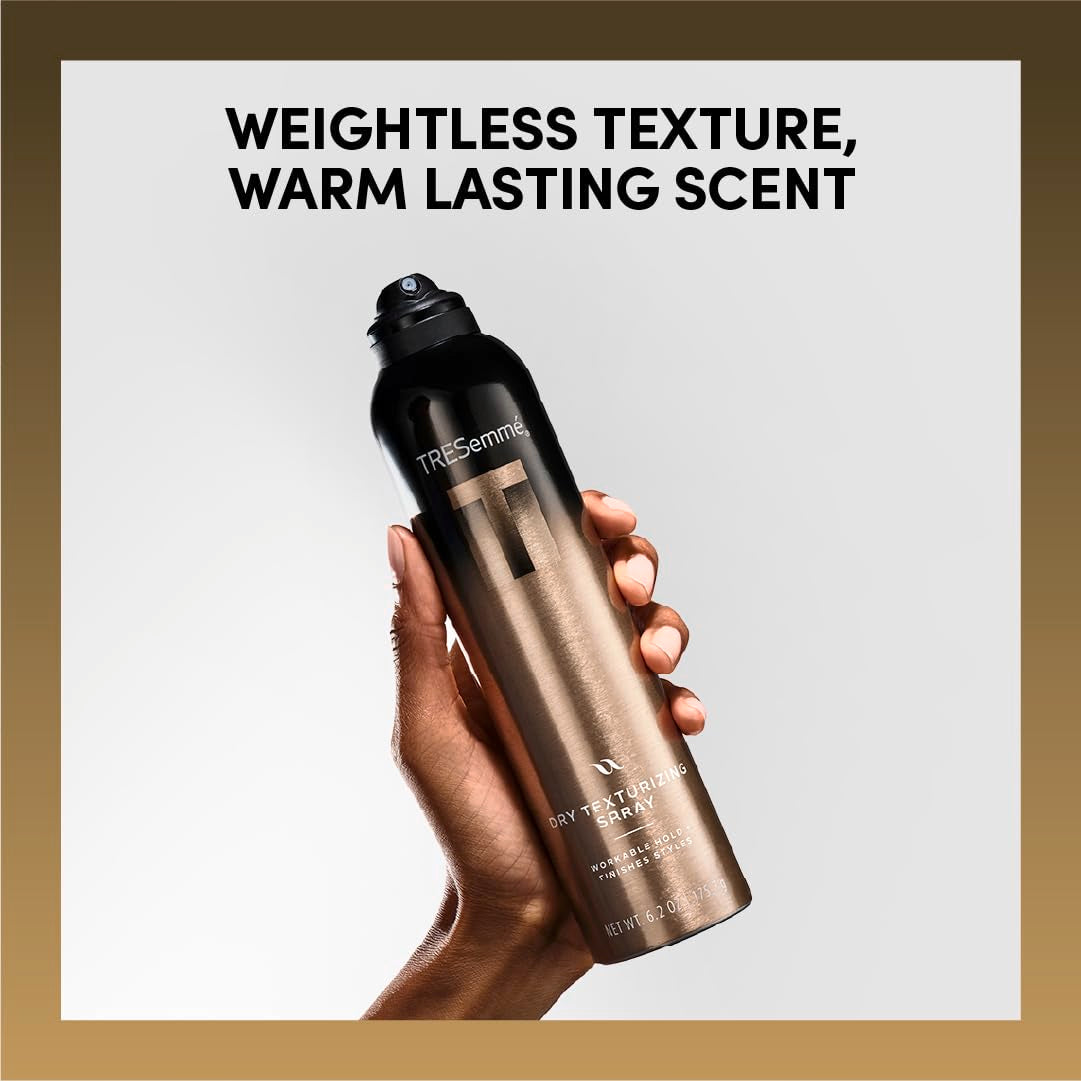 TRESemmé A-List bottle held to show 6.2 oz scale and portability