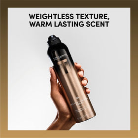 TRESemmé A-List bottle held to show 6.2 oz scale and portability