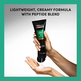 TRESemmé being applied to wet hair demonstrating even distribution benefit
