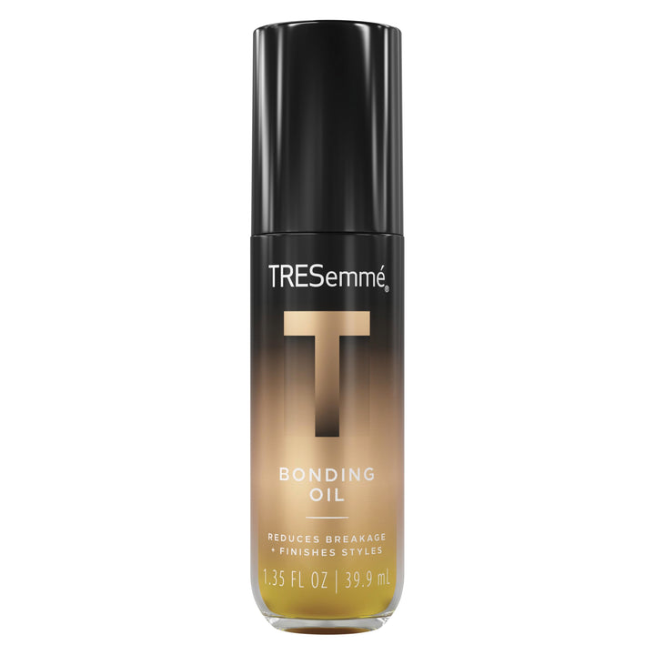 TRESemmé bottle front view showing compact finishing oil, boosts shine
