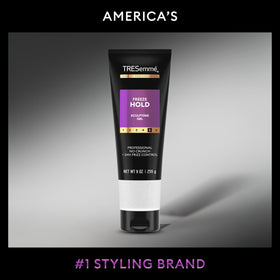 TRESemmé bottle beside a hand to show 9 oz size and travel-friendly benefit