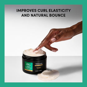 TRESemmé cream texture close-up highlighting peptide blend for stronger curls