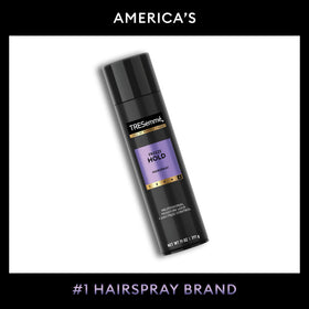 TRESemmé freeze hold held in hand to show true 11 fl oz size