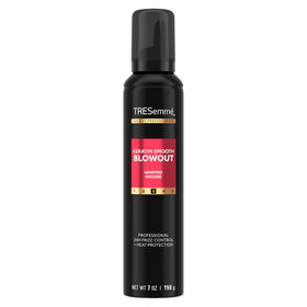 TRESemmé front packaging of whipped shaping mousse showing product benefit