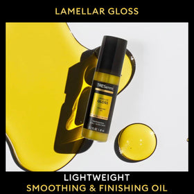 TRESemmé finishing oil smoothing dry hair to tame flyaways and boost shine