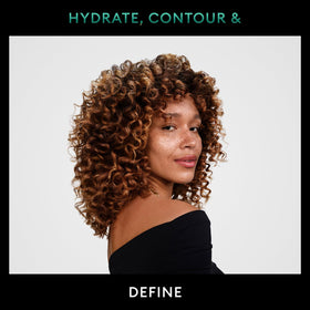 TRESemmé product pour with coconut droplet to show nourishing oils