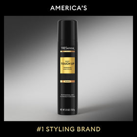 TRESemmé held in hand illustrating travel-friendly 2.5 oz convenience
