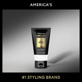 TRESemmé bottle beside credit card showing 2 oz size for TSA-friendly travel