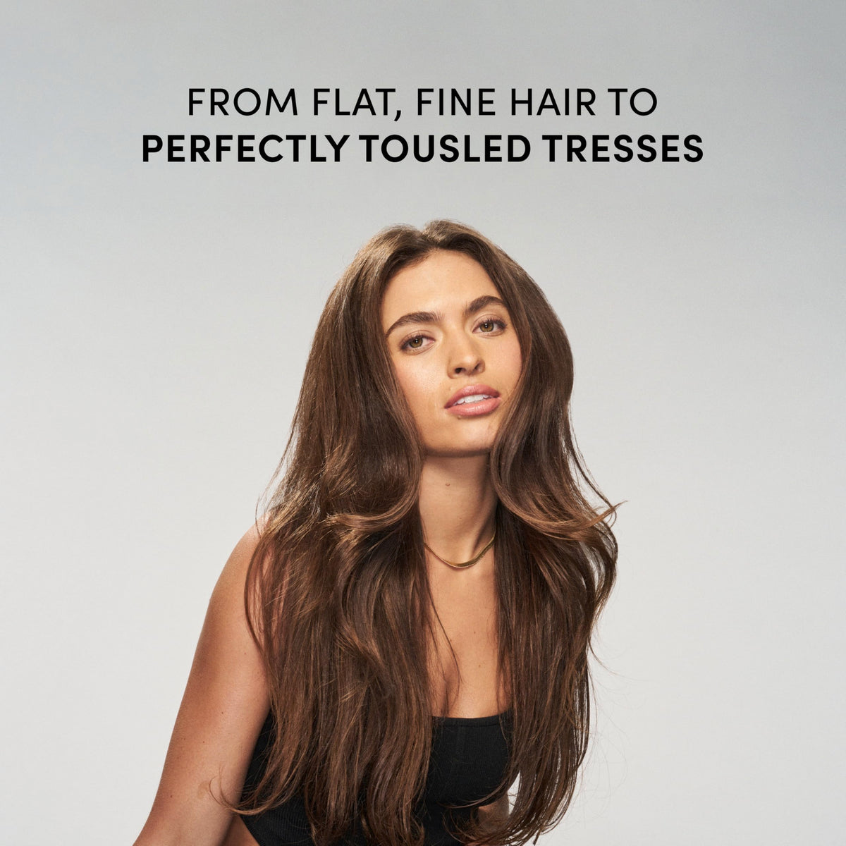 TRESemmé can in hand showing 6.2 oz size for travel-friendly styling