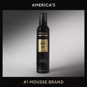 TRESemmé size comparison held in hand to illustrate 10.5 oz bottle scale