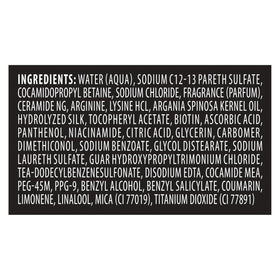 TRESemmé Smooth and Silky bottle on bathroom shelf in lifestyle setting implying daily use