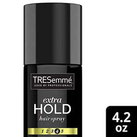 TRESemmé spray action close-up demonstrating fine mist for even, reliable hold