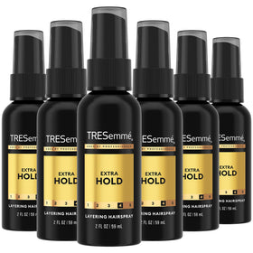 TRESemmé front packaging of six travel hairspray bottles shows convenient travel-ready hold