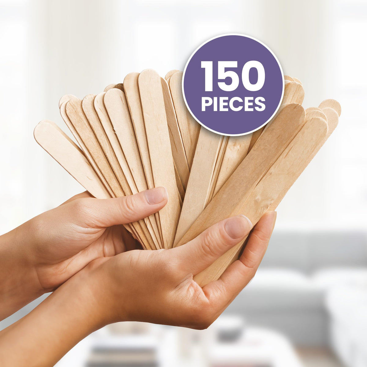 Tress Wellness stick spreading wax on leg demonstrating precise application control
