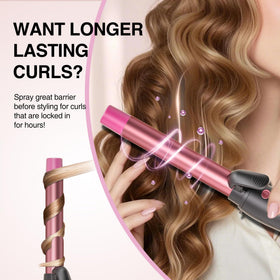 Tresses Touch curling iron in use on long hair creating loose waves
