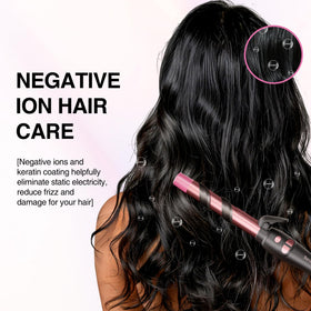Tresses Touch held in hand to show lightweight size and balance