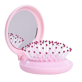 Trikeel front closed view compact brush with mirror, perfect for travel