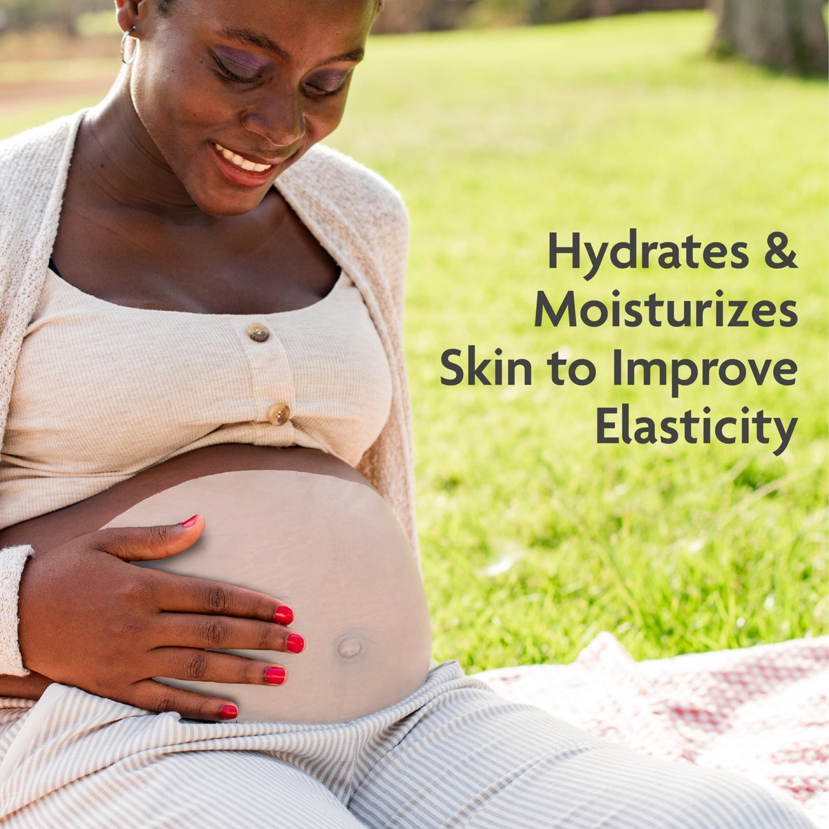 TriLASTIN applied on pregnant belly soothing itchy, stretched skin