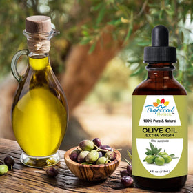 Tropical Holistic olive oil poured from bottle highlighting cold‑pressed texture and purity