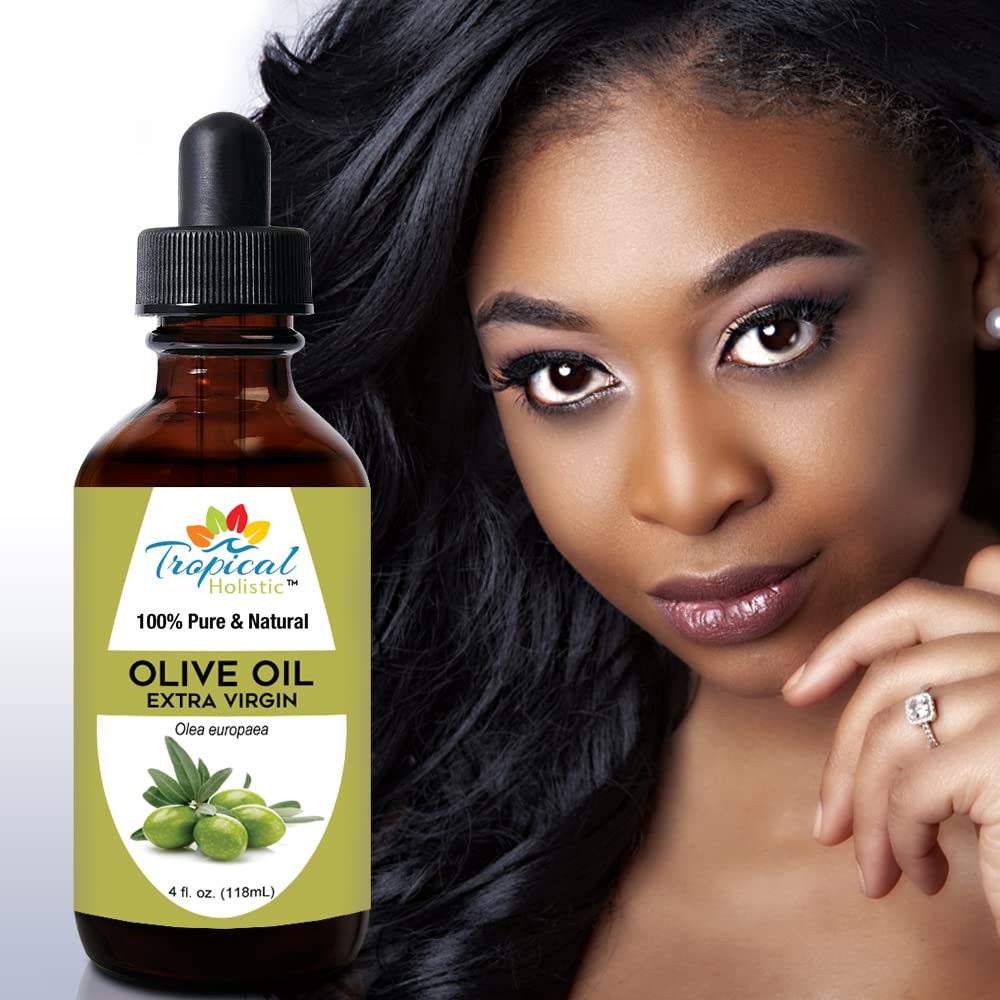 Tropical Holistic applied to hair mid‑lengths showing conditioning and shine benefit