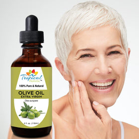 Tropical Holistic bottle held in hand showing 4 oz scale for travel convenience